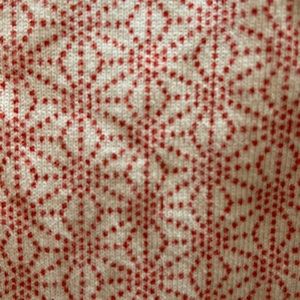Tea Collection leggings.  White with red star-like pattern.  Girls 10.